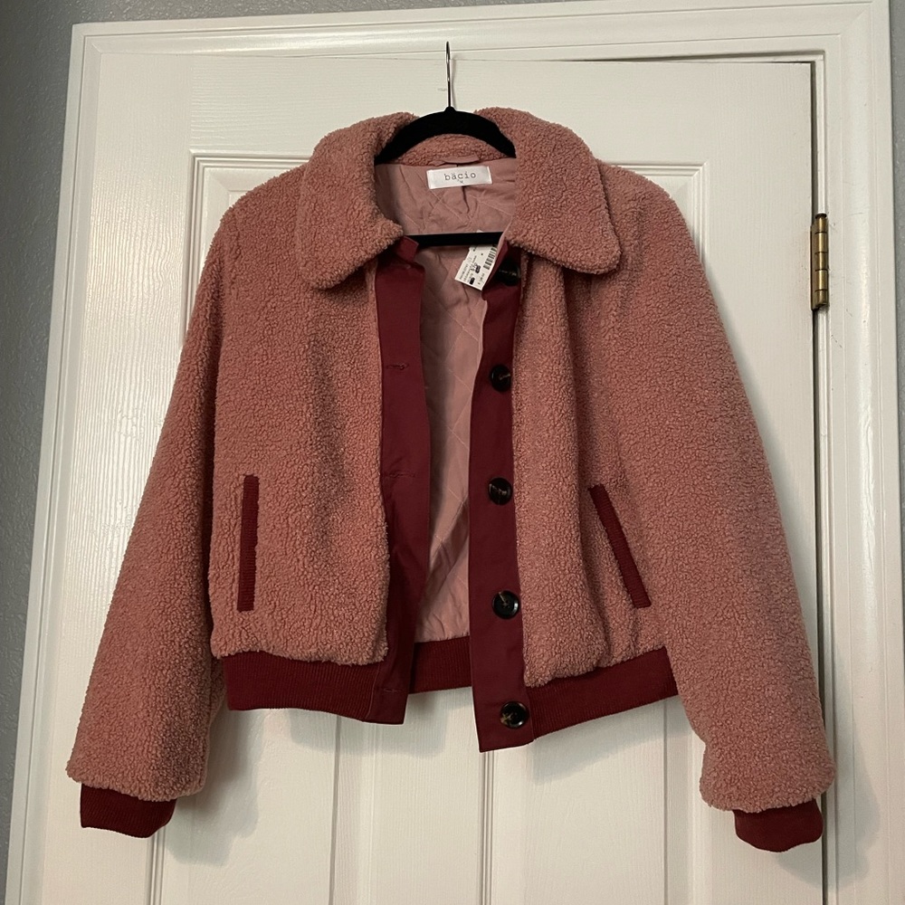 Pink fleece jacket with buttons